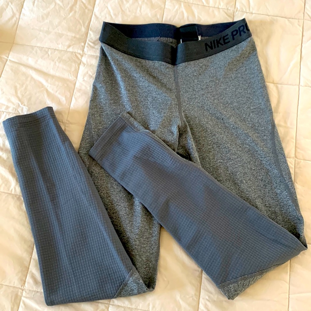 Nike Pro Dr Fit running tights Low Rise 26” inseam. No pockets